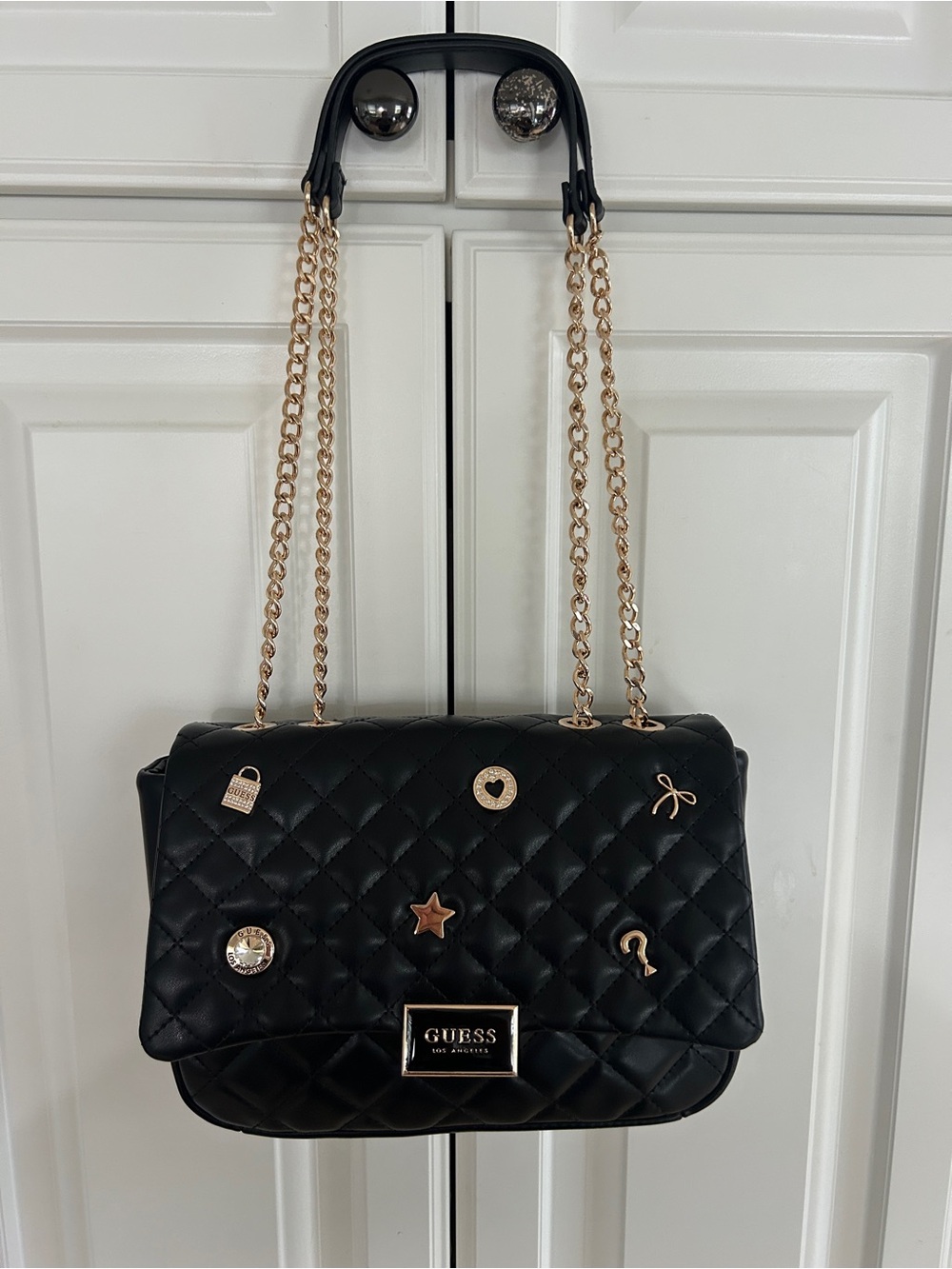 Guess Black Quilted Shoulder Bag with Gold Chains and Charms